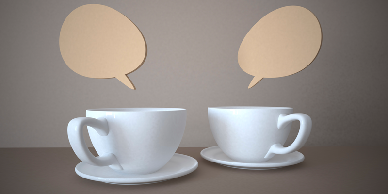 Dos tazas de té con burbujas de dialogo encima